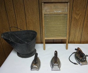 lot 157 image: AntiquesCapital Brass Washboard, Coal Bucket, Irons