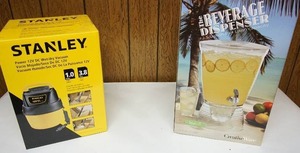 lot 182 image: Did You Say Christmas Gifts Still in the Box are a Stanley WetDry Vac and a Beverage Dispenser