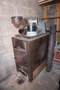lot 378 image: IndoorOutdoor furnacestove