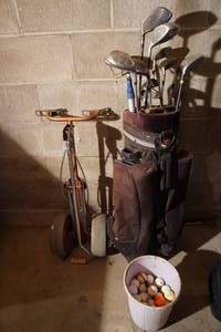 lot 379 image: Golf clubs, balls, cart Etc.