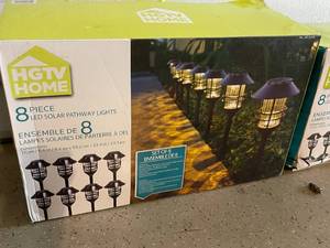 lot 44 image: 2 Sets Of HGTV Home LED Solar Pathway Lights