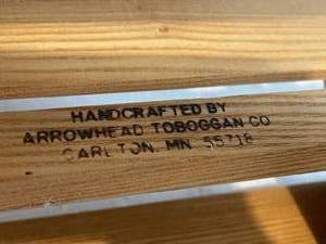 lot 50 image: Wooden Arrowhead Toboggan Company Sled