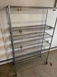 lot 85 image: 6 Shelf Metal Rolling Garage Storage