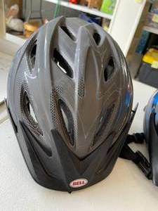 lot 87 image: 3 Biking Helmets by Bell, Schwinn and Carrera