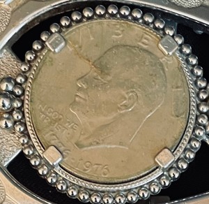 lot 197 image: Antique Horseshoe Shaped Belt Buckle with a 1976 Coin