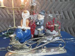 CAROLING COUPLE WITH GORGEOUS TALL VASE AND SPARKLEY TWIGS