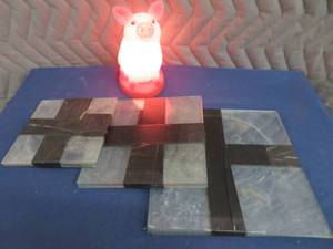 HEAVY GLASS SHELVES AND A PIG