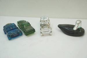 lot 62 image: Vintage Avon Aftershave Containers