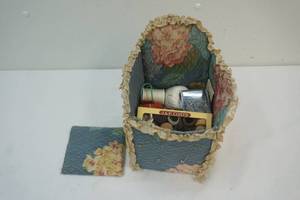 lot 63 image: sewing supplies in a chair, sewing machine accessories box