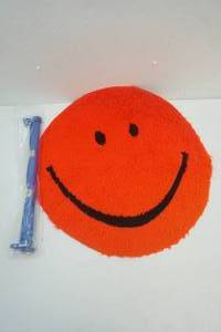lot 235 image: smiling rug