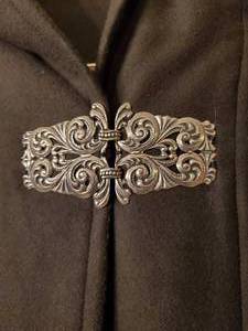 lot 79 image: Fantastic Heavy Wool Unique BrownishGreen Hooded Coat Cloak Cape With Amazing Ornate Metal Scroll Design Front Closure