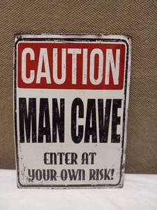 lot 84 image: CAUTION MAN CAVE SIGN