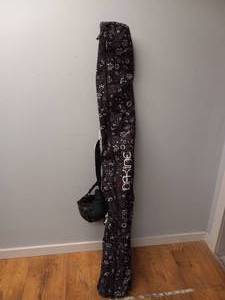 lot 100 image: DAKINE SKI BAG & SKI EQUIPMENT WITH HELMET