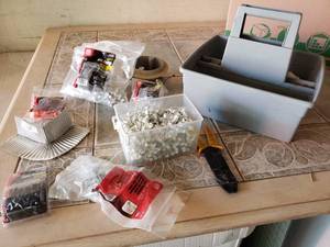 lot 42 image: Electric Wire Staples and Container