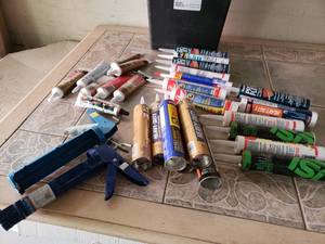 lot 70 image: Various Tubes of Caulk and Liquid Nails.