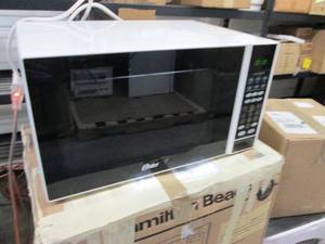 Oster Microwave used, powers on...