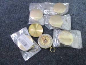 5 Gold Tone Compasses...