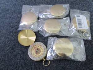 5 Gold Tone Compasses...
