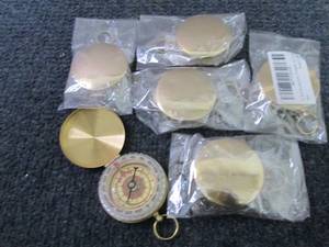 5 Gold Tone Compasses...