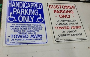 Large Handicap and Customers Only Signs