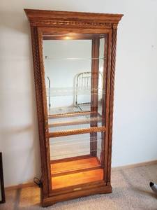 Curio Cabinet By Howard Miller