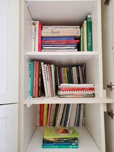 Three Shelves Of Cookbooks