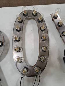 lot 820 image: 21  120V Decorative Letter O Light
