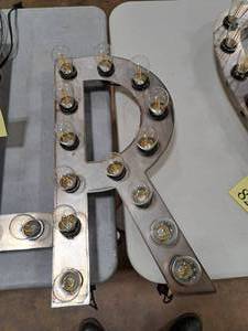 lot 821 image: 21  120V Decorative Letter R Light