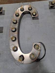 lot 823 image: 21  120V Decorative Letter C Light