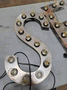 lot 825 image: 22  120V Decorative Letter S Light