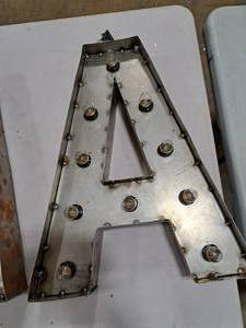 lot 829 image: 18  120V Decorative Letter A Light
