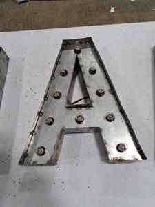 lot 830 image: 18  120V Decorative Letter A Light