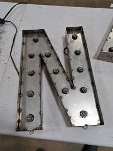 lot 831 image: 18  120V Decorative Letter N Light