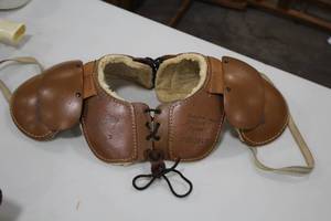 lot 885 image: Vintage Wilsons Leather Football Shoulder Pads