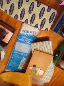 Small stack of assorted sewing fabr...