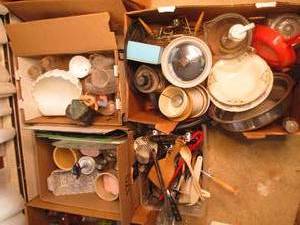 Overflowing Boxes of kitchen utensi...