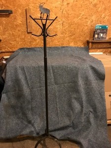 lot 104 image: Metal hat rack with elk figurine on top