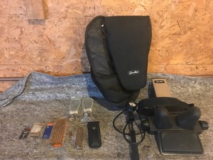 lot 118 image: Saunders gun case, Saunders shooting rest, uncle Henry buck knife with case, 118 rounds of 22 shells, 2 Springfield armory locks and 1 round of 9mm