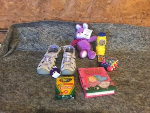 lot 122 image: Kids shoes, bubbles, crayons, big Jax game, bible and stuffed rabbit
