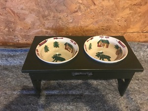 lot 124 image: Dog stand with dishes