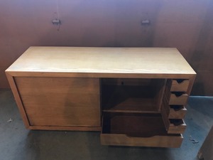 lot 138 image: Solid wood buffet with slide out drawer and sores that slide from side to side