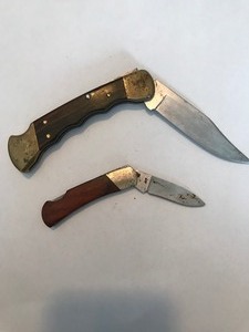 lot 140 image: 2 buck knives