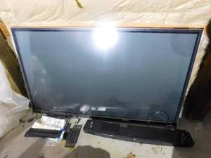 lot 37 image: LG tv and sound bar