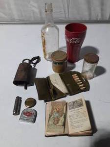 lot 223 image: Vintage sewing kit, air gage, bottles, cow bell and more