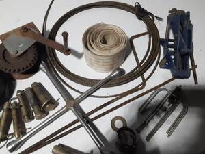 lot 229 image: Wench,hitch pins,2 jacks,clamps and more