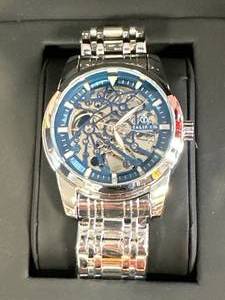 lot 18 image: New Talis Co. Blue Skeleton Watch $735 Retail