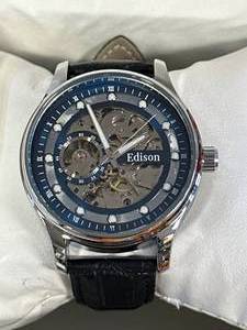 lot 26 image: New Edison Blue & Silver Skeleton Watch $675 Retail