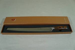 lot 61 image: Tuo Cutlery Fiery Phoenix 14 Serrated Slicing and Carving Knife