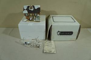 lot 285 image: Hawthorne MJ Hummel Companys Coming Lighted Christmas House
