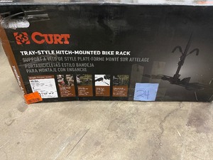 lot 24 image: Curt 18085 Tray-Style Hitch Mounted Steel 2-Bike Rack for 1.252 Receivers